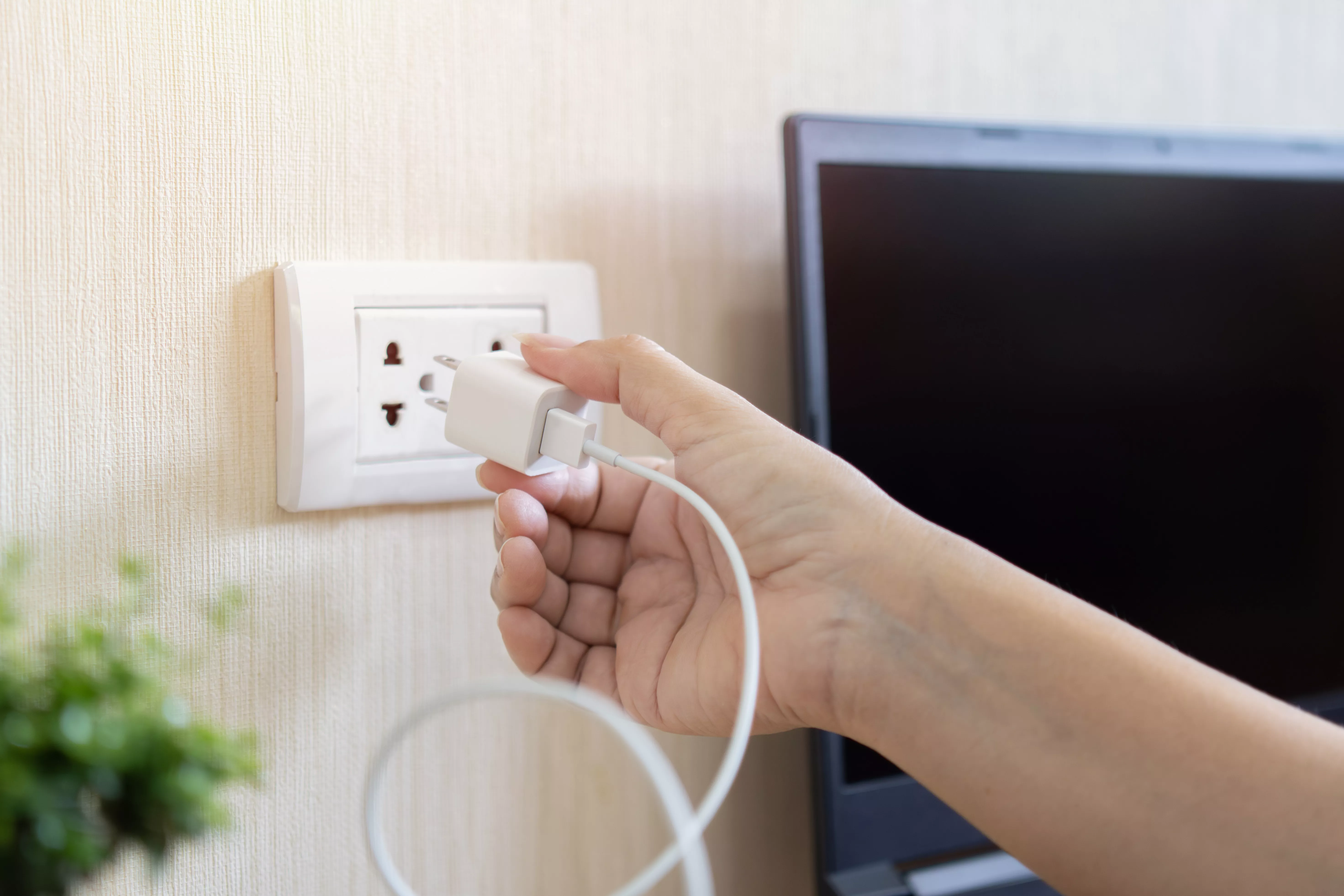 Handing plugging in a phone charger