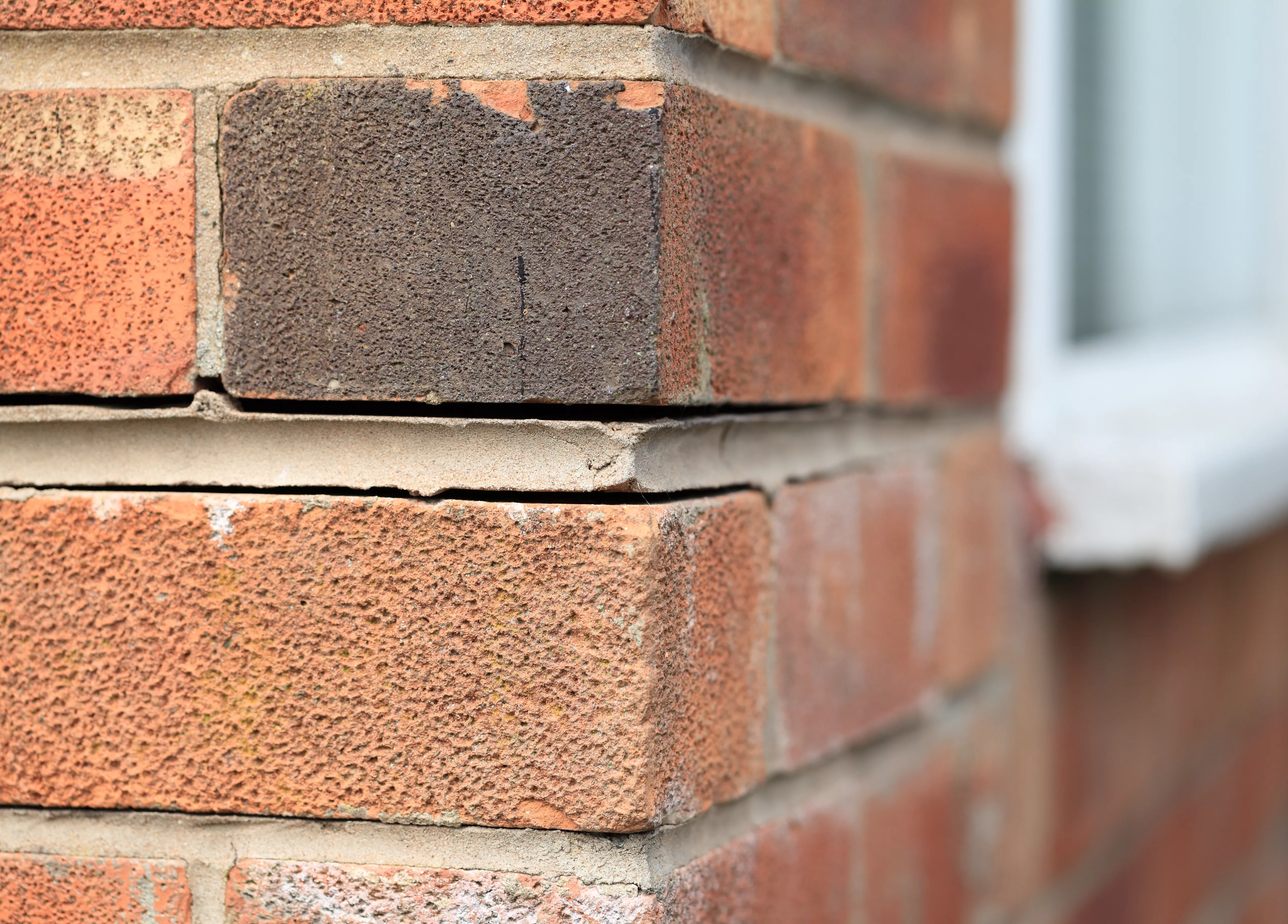 gaps between bricks on house exterior