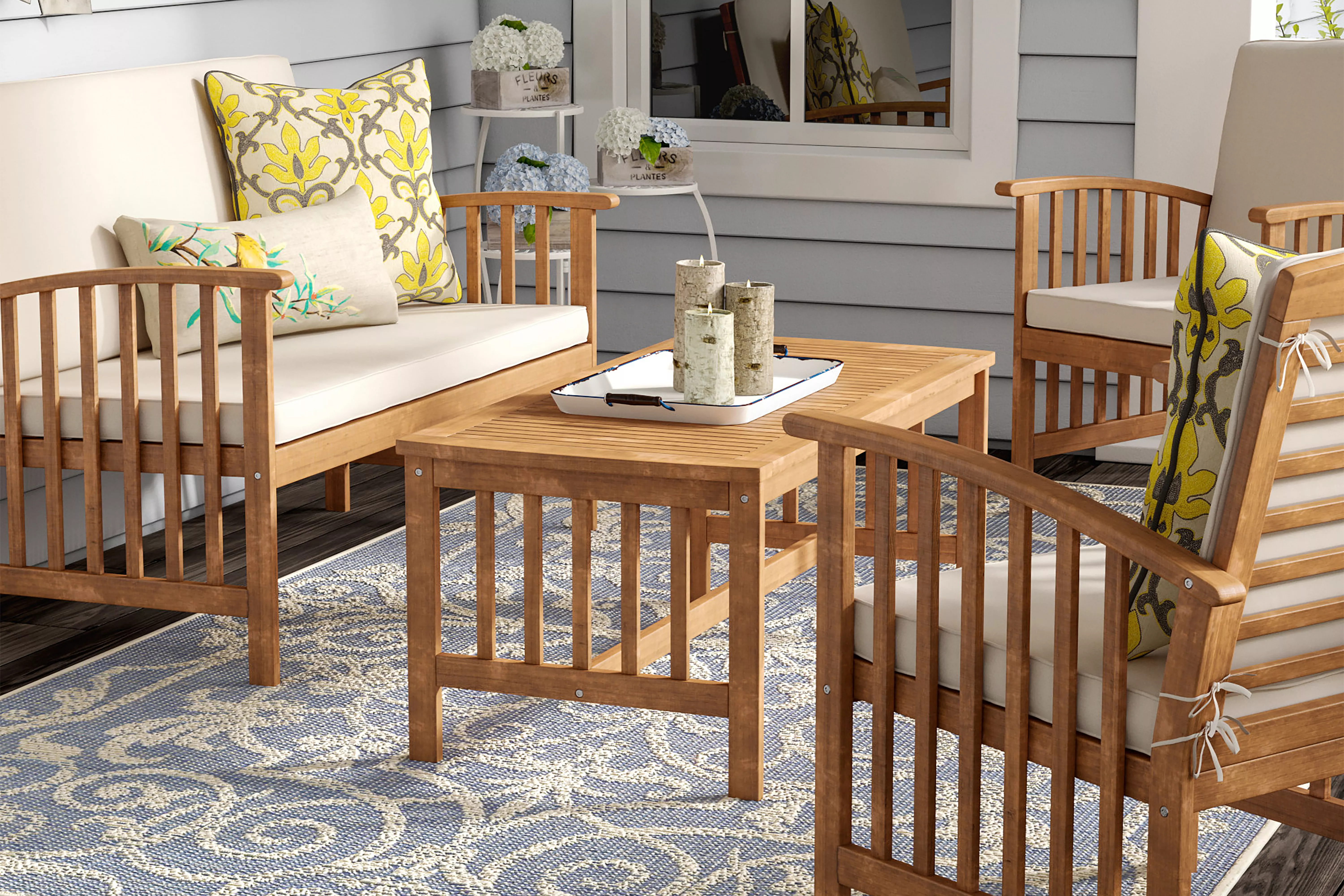 Delosreyes 4 Piece Sofa Seating Group with Cushions in outdoor space