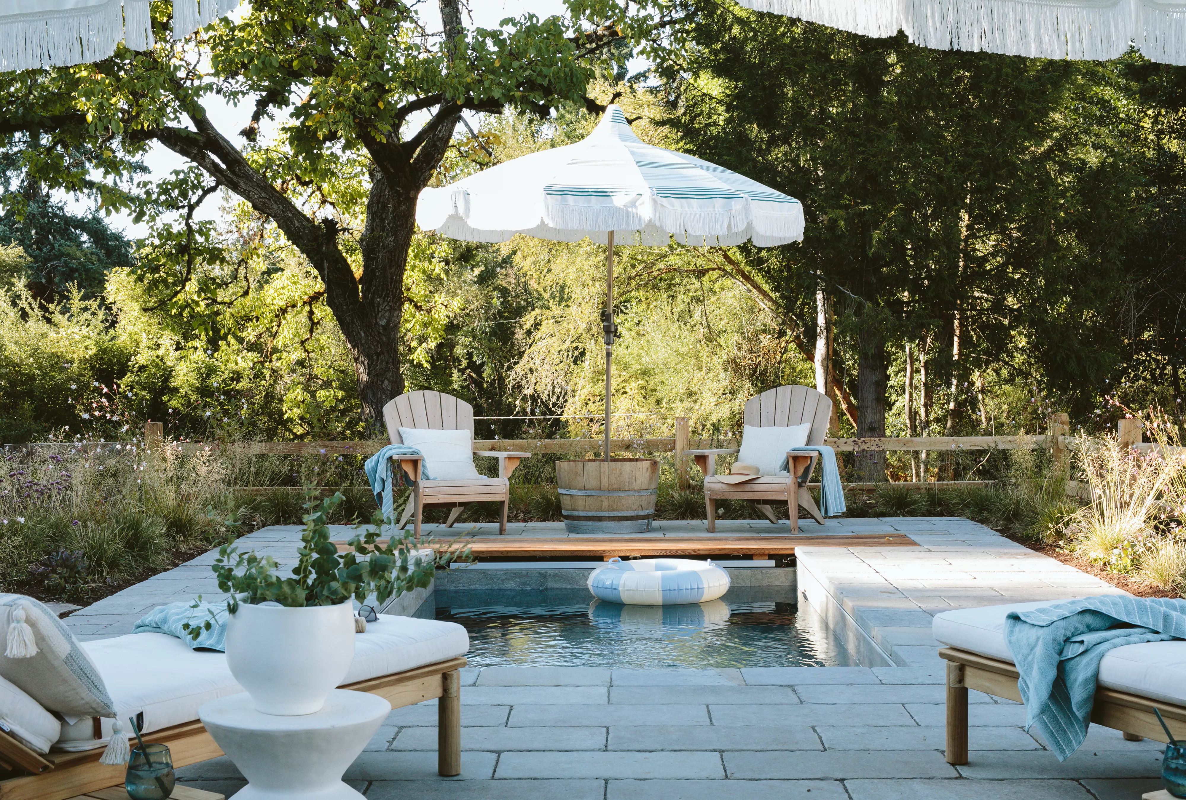 backyard pool in wooded area
